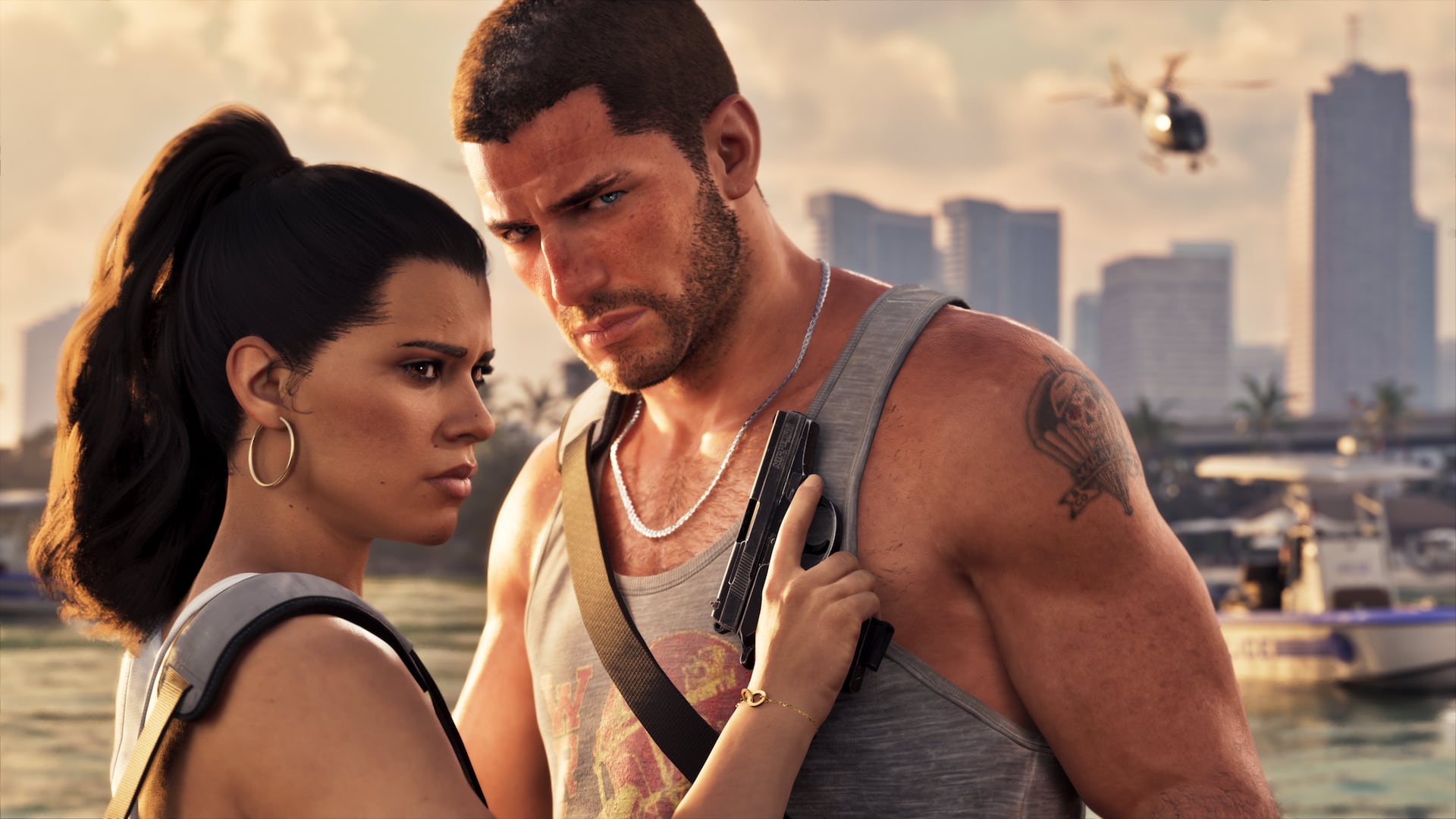 Jason and Lucia together with Vice City and police vehicles behind them in Grand Theft Auto VI